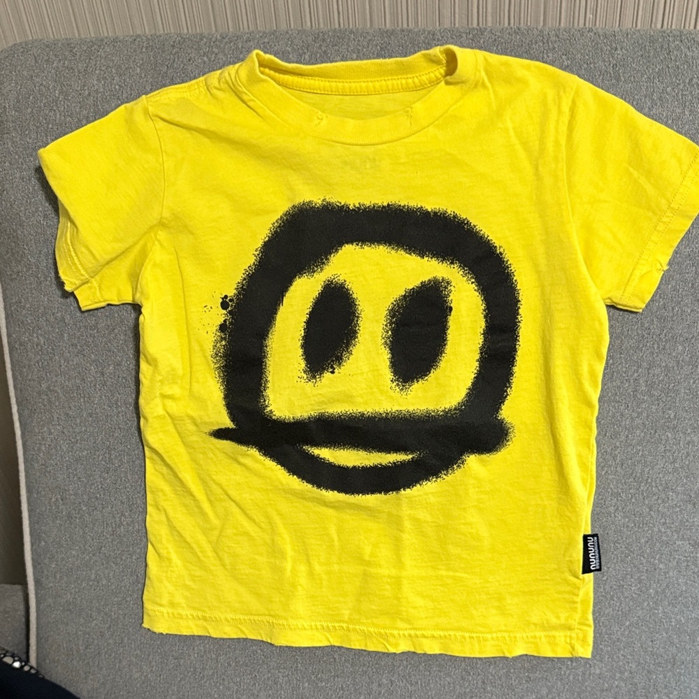 nununu Yellow Tee with Black Smiley Graphic